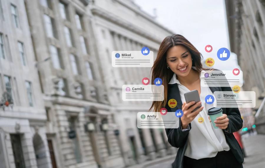 Woman engaging with social media likes and comments on her phone